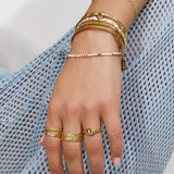 Anel Sinete Espiral Cravejado - Ouro 18K | SILLENE