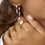 Anel Torcido com Pérola - Ouro 18K | SILLENE