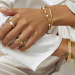 Anel Torcido com Pérola - Ouro 18K | SILLENE