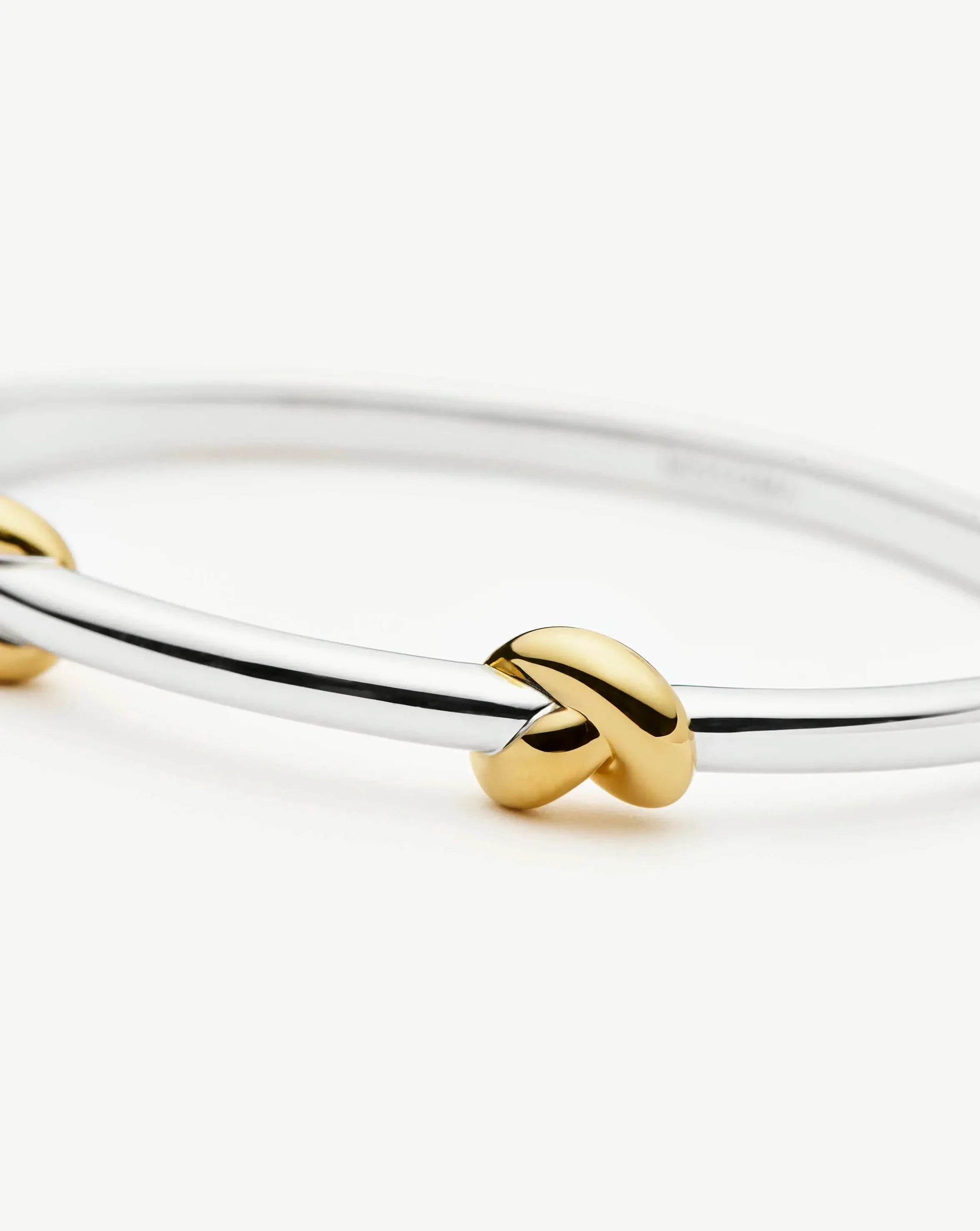 Bracelete Nó Articulado - Ouro e Prata | SILLENE