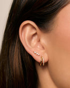 Brinco Ava Tarraxa Plana - Ouro 18K | SILLENE - uso