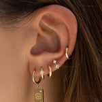 Brinco Bonnie Estrela - Ouro 18K | SILLENE - uso