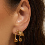 Brinco Cereja Pacha - Ouro 18K | SILLENE - uso