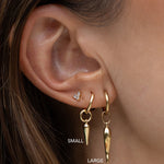 Brinco Cornicello Pequeno - Ouro 18K | SILLENE - uso