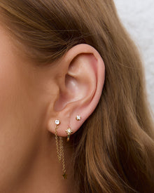 Brinco Corrente Estrela Starla - Ouro 18K | SILLENE - uso