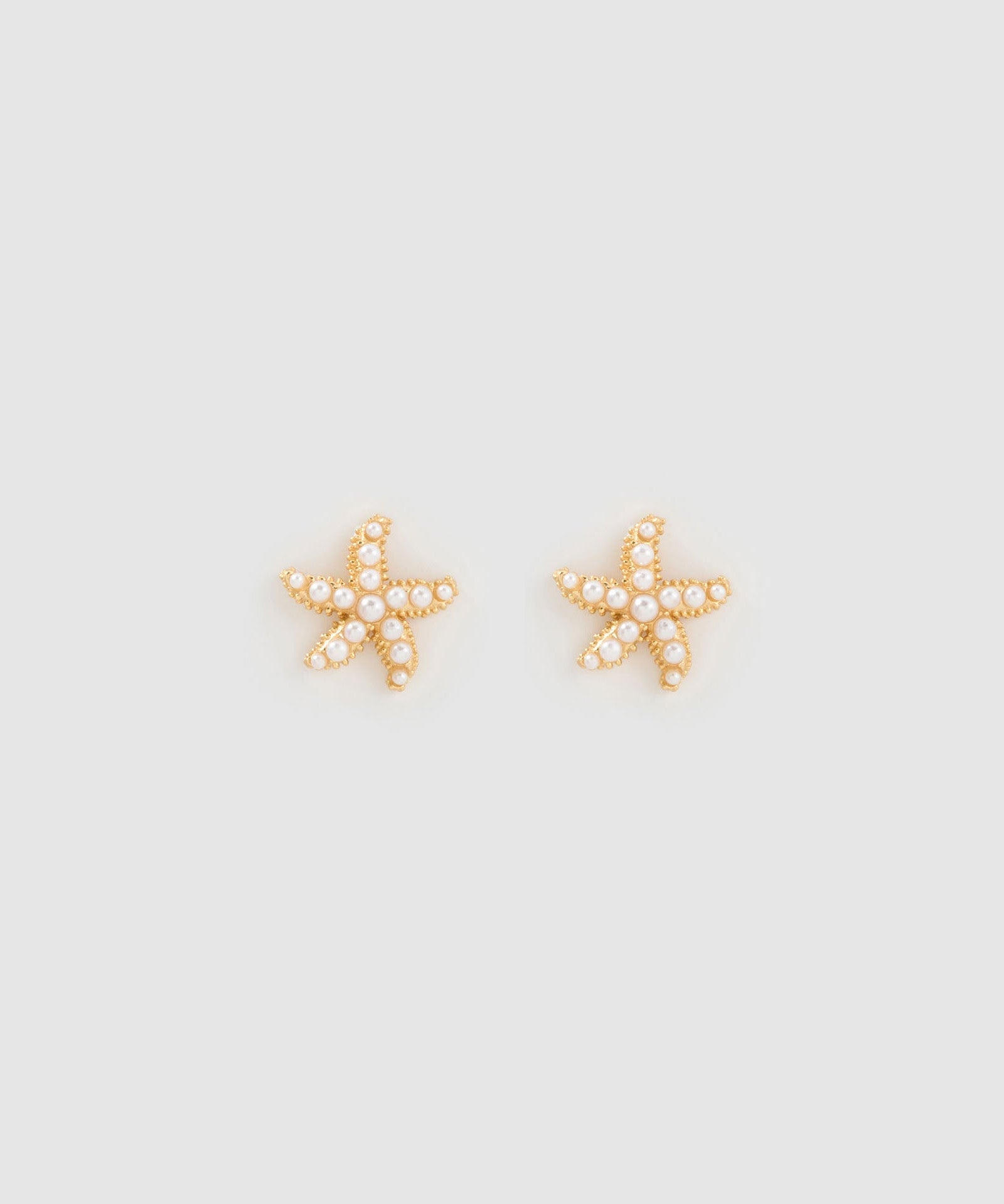 Brinco Estrela do Mar Malibu Pérola - Ouro 18K | SILLENE