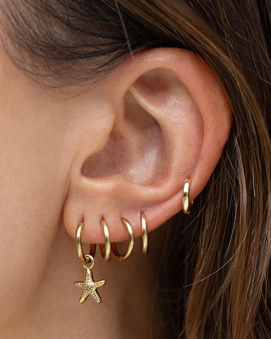 Brinco Estrela-do-Mar - Ouro 18K | SILLENE - uso
