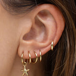 Brinco Estrela-do-Mar - Ouro 18K | SILLENE - uso