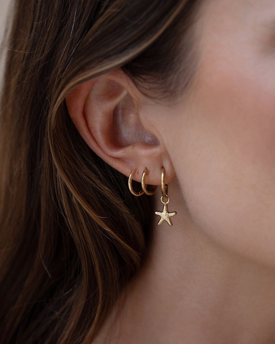 Brinco Estrela-do-Mar - Ouro 18K | SILLENE - uso