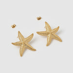 Brinco Estrela do Mar Siesta - Ouro 18K | SILLENE