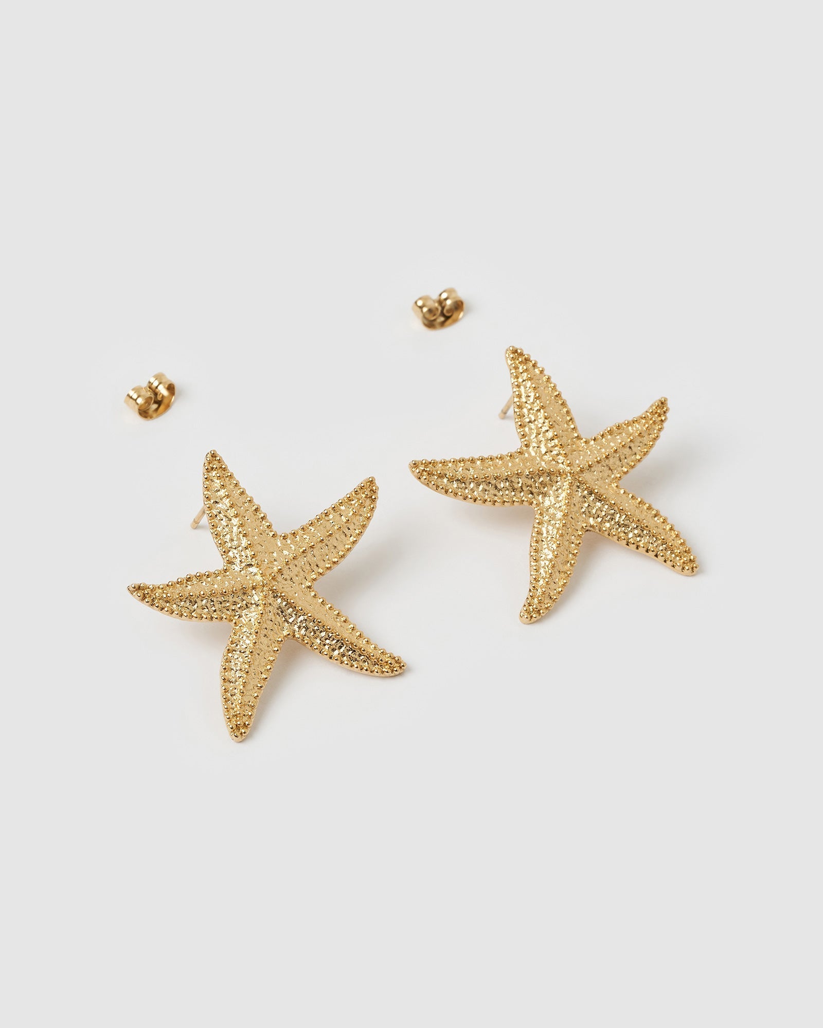 Brinco Estrela do Mar Siesta - Ouro 18K | SILLENE