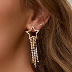 Brinco Estrela Starburst - Ouro 18K | SILLENE - uso
