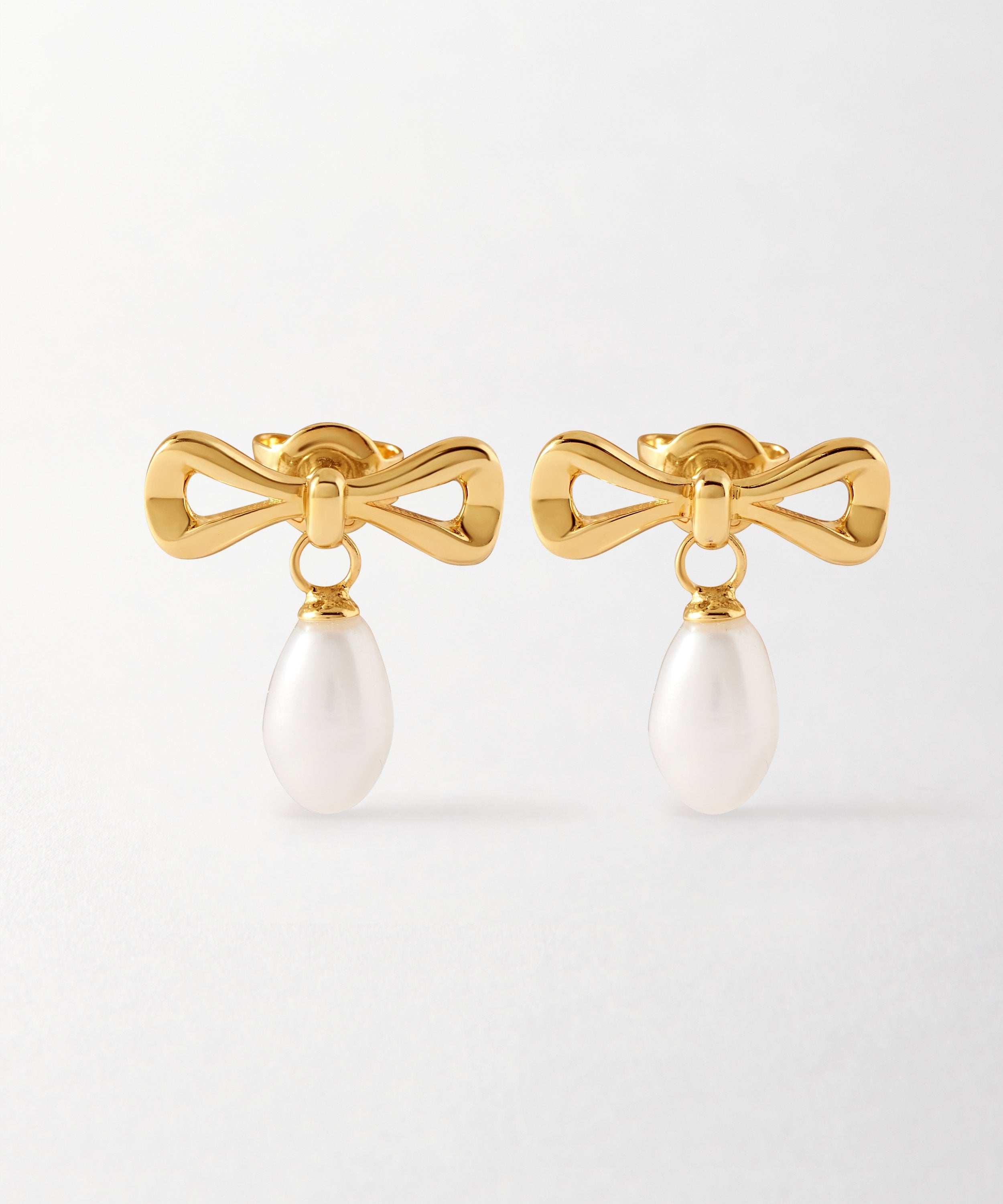 Brinco Laço Pérola - Ouro 18K | SILLENE