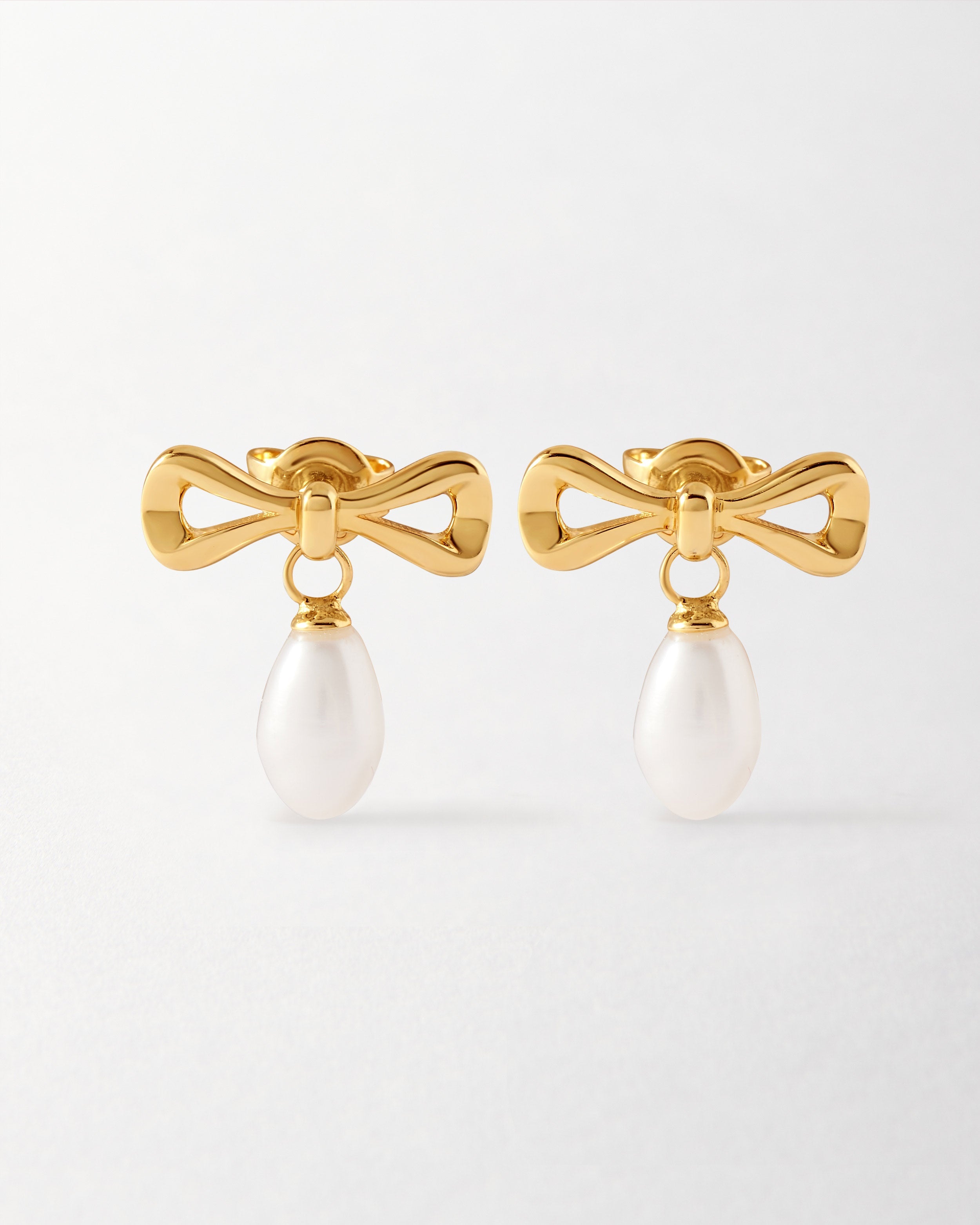 Brinco Laço Pérola - Ouro 18K | SILLENE