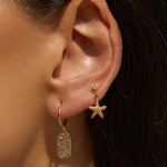 Brinco Neptuno - Ouro 18K | SILLENE - uso