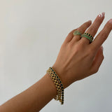 Pulseira Bisel Ballier Esmeralda Verde - Ouro 18K em uso | SILLENE