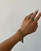Pulseira Bisel Ballier Esmeralda Verde - Ouro 18K em uso | SILLENE