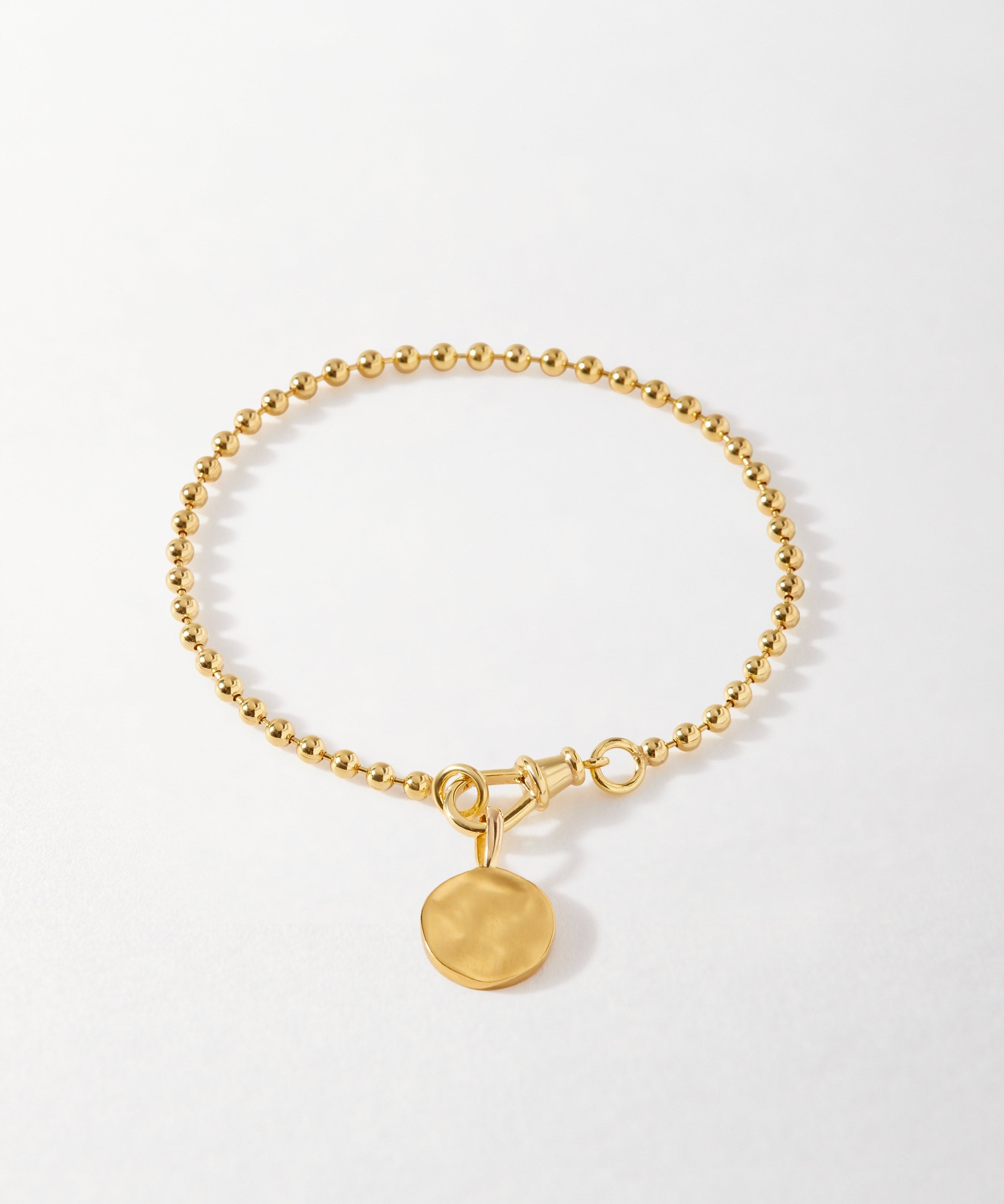 Pulseira Moeda Globo - Ouro 18K | SILLENE