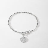 Pulseira Moeda Globo - Prata | SILLENE
